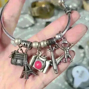 Avon vintage silver tone charms bracelet